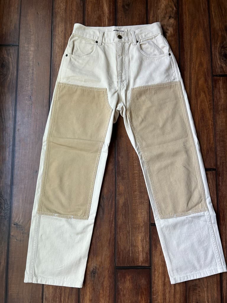 Cream pants with tan knee patches
